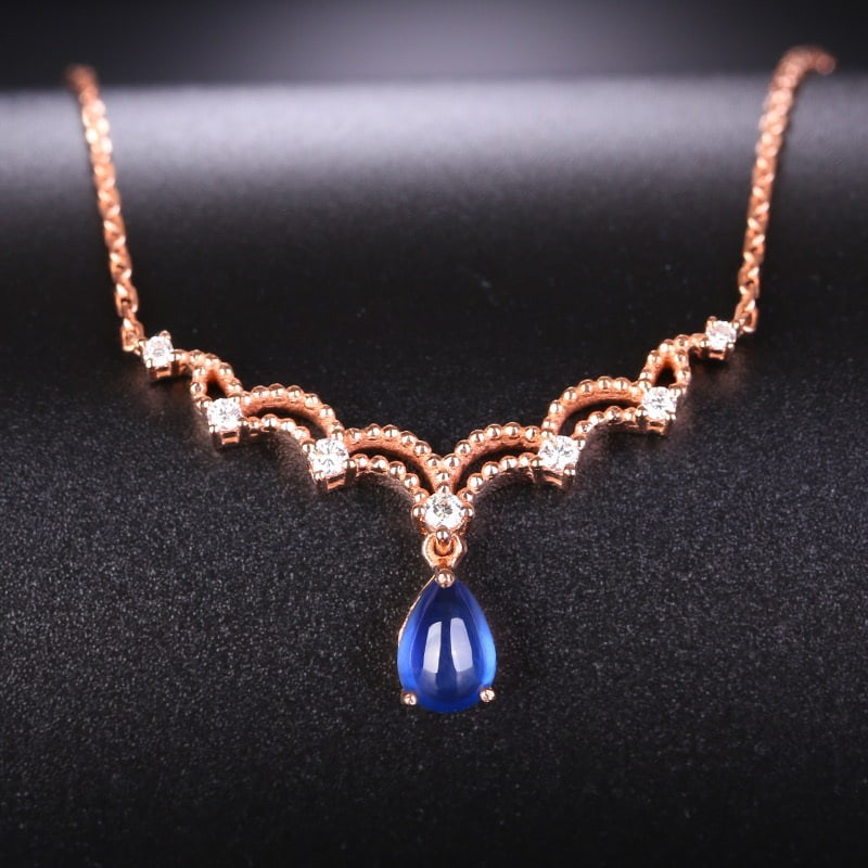 14k Gold 0.7 Ct Natural Sapphire & Diamond Necklace: Ref:231030235 // gold content:14k gold // main gemstone:sapphire // shape:pear // carat weight:0. 7ct // color:blue // treatment:natural // // adjacent gemstone 2 : diamond // shape:round // clarity