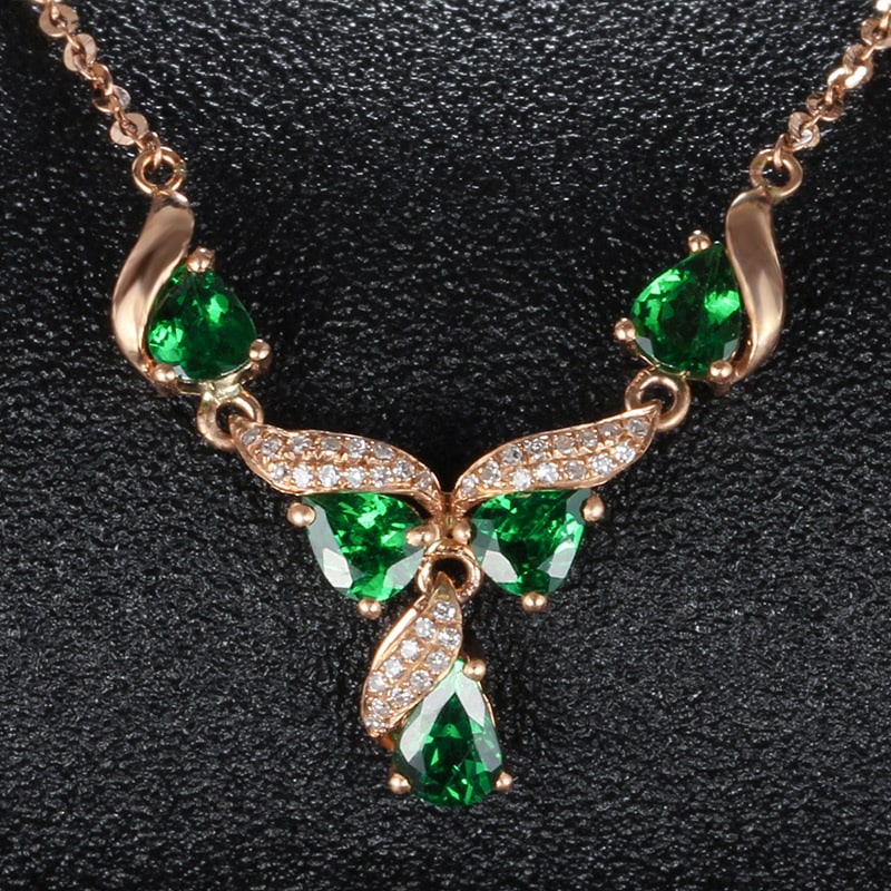14k Gold 1.73 Ct Vivid Green Natural Tsavorite & Diamond Necklace: Ref:231030239 // gold content:14k gold // main gemstone:tsavorite // shape:pear // carat weight:1. 73ct // color:vivid green // treatment:natural // // adjacent gemstone 2 : diamond // shape:round //
