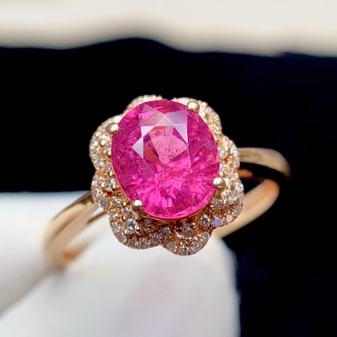 14k Gold 2.13 Ct Natural Tourmaline & Diamond Ring: Ref:231030241 // gold content:14k gold // ring size:7. 25us // // main gemstone:tourmaline // shape:oval // carat weight:2. 13ct // color:red // treatment:natural // // adjacent gemstone 2 : diamond