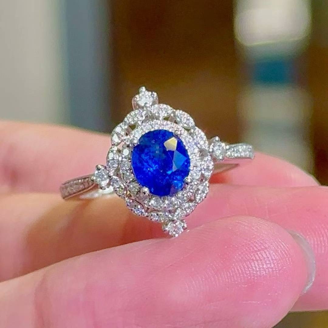 14k Gold 1.43 Ctw Natural Sapphire & Diamond Ring: Ref:231030244 // gold content:14k gold // ring size:7. 25us // // main gemstone:sapphire // shape:oval // carat weight:1. 07ct // color:royal blue // treatment:natural // // adjacent gemstone 2 :