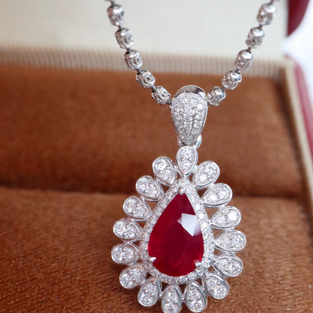 14k Gold 1.46 Ctw Vivid Red Natural Ruby & Diamond Pendant( Without Chain ): Ref:231030248 // gold content:14k gold // main gemstone:ruby // shape:pear // carat weight:1. 10ct // color:vivid red // treatment:natural // // adjacent gemstone 2 : diamond // shape:round // carat