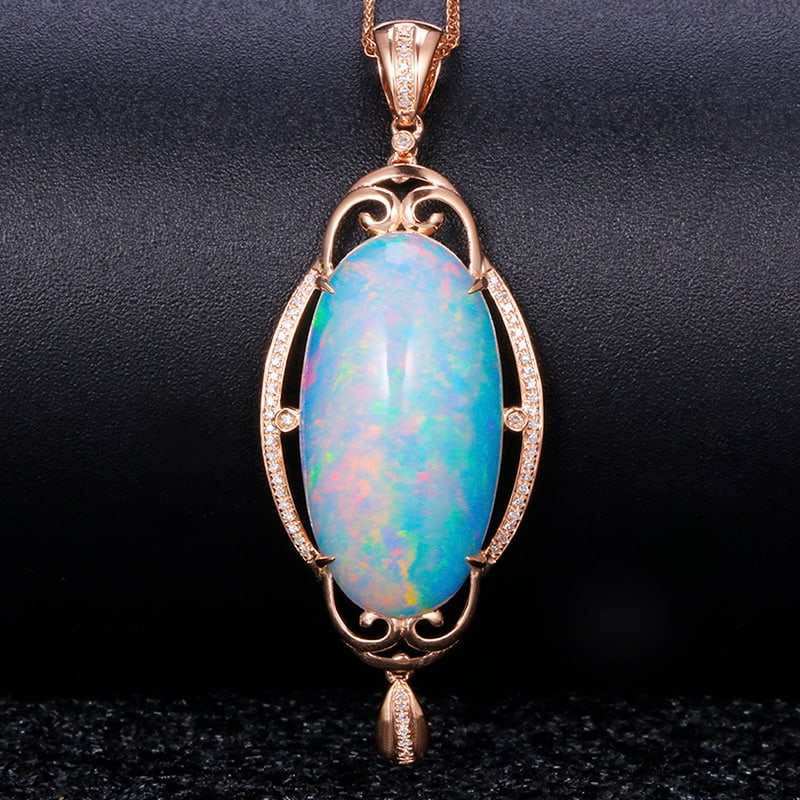 14k Gold 15.14 Ctw Natural Opal & Diamond Pendant( Without Chain ): Ref:231030252 // gold content:14k gold // main gemstone:opal // shape:oval // carat weight:14. 95ct // color:color // treatment:natural // // adjacent gemstone 2 : diamond // shape:round // carat