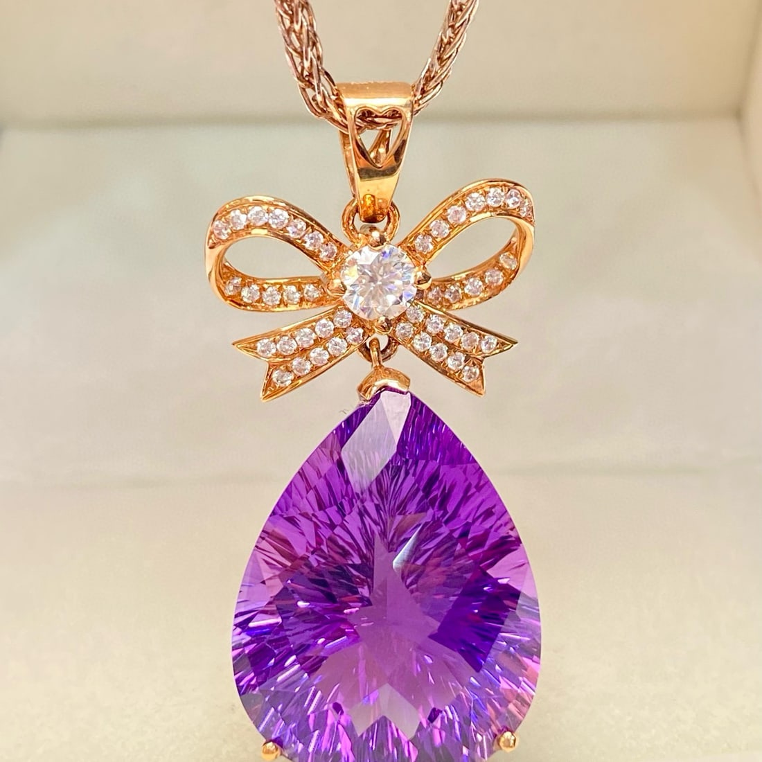 14k Gold 17.9 Ct Natural Amethyst & Zircon Pendant( Without Chain ): Ref:231030300 // gold content:14k gold // main gemstone:amethyst // shape:pear // carat weight:17. 9ct // color:purple // treatment:natural // // adjacent gemstone 2 : zircon // number of stones:45