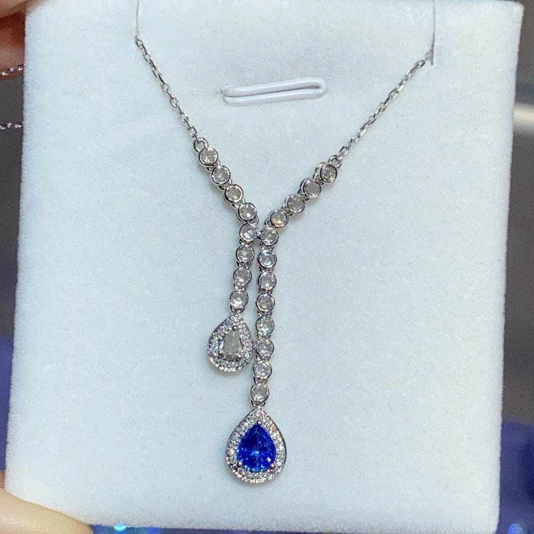 14k Gold 1.05 Ct Natural Sapphire & Diamond & Sapphire Necklace: Ref:231030312 // gold content:14k gold // main gemstone:sapphire // shape:pear // carat weight:1. 05ct // color:blue // treatment:natural // // adjacent gemstone 2 : diamond // number of stones:36 //