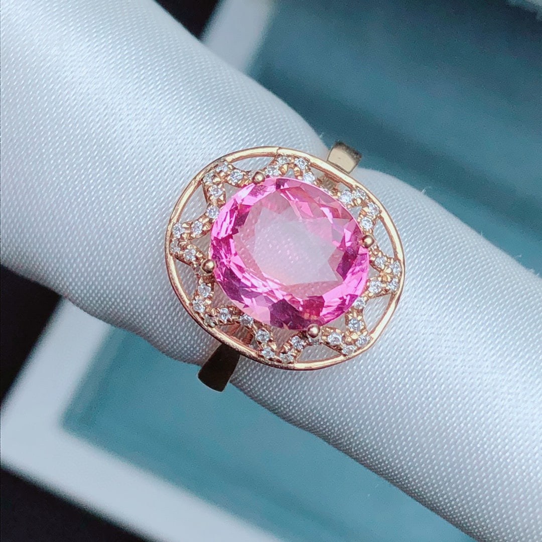 14k Gold 2.28 Ct Natural Tourmaline & Diamond Ring: Ref:231030330 // gold content:14k gold // ring size:7. 25us // // main gemstone:tourmaline // shape:oval // carat weight:2. 28ct // color:pink // treatment:natural // // adjacent gemstone 2 : diamond