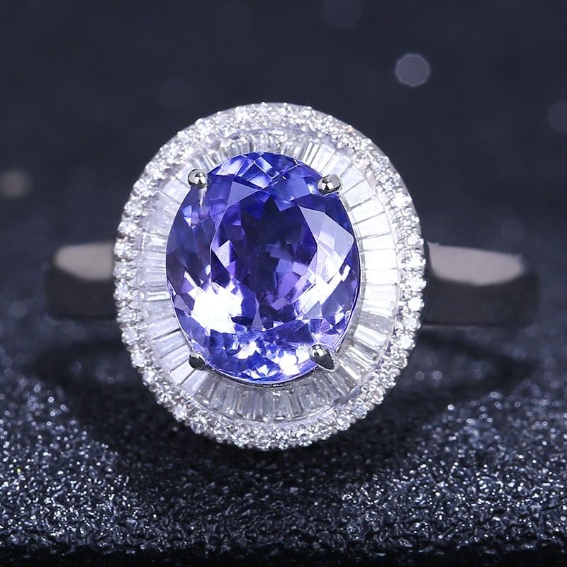 14k Gold 3.41 Ct Natural Tanzanite & Diamond Ring: Ref:231030344 // gold content:14k gold // ring size:7. 25us // // main gemstone:tanzanite // shape:oval // carat weight:3. 41ct // color:bluish purple // treatment:natural // // adjacent gemstone 2 :