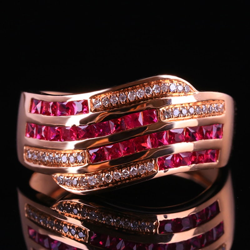 14k Gold 0.77 Ctw Natural Ruby & Diamond Ring: Ref:231030346 // gold content:14k gold // ring size:7. 25us // // main gemstone:ruby // shape:princess // carat weight:0. 65ct // color:red // treatment:natural // // adjacent gemstone 2 : diamond //