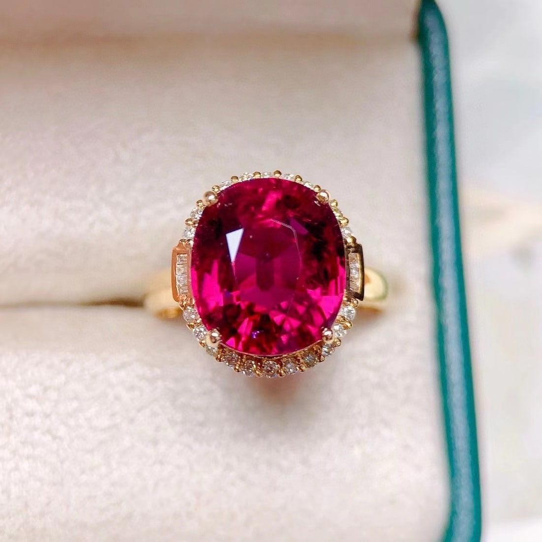 14k Gold 7.65 Ct Natural Tourmaline & Diamond Ring: Ref:231030388 // gold content:14k gold // ring size:7. 25us // // main gemstone:tourmaline // shape:oval // carat weight:7. 65ct // color:red // treatment:natural // // adjacent gemstone 2 : diamond