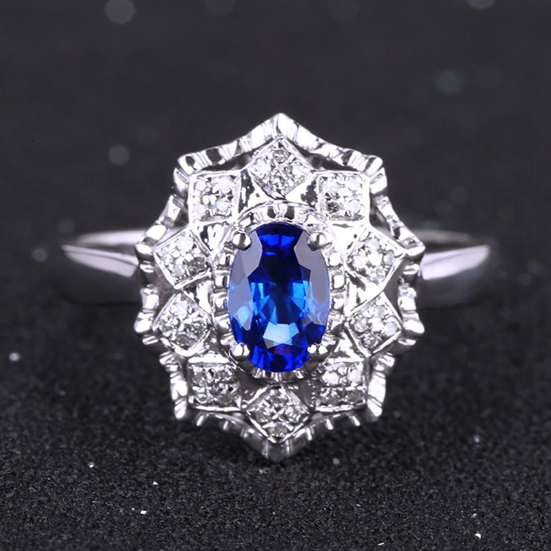 14k Gold 0.92 Ctw Natural Sapphire & Diamond Ring: Ref:231030413 // gold content:14k gold // ring size:7. 25us // // main gemstone:sapphire // shape:oval // carat weight:0. 80ct // color:royal blue // treatment:natural // // adjacent gemstone 2 :