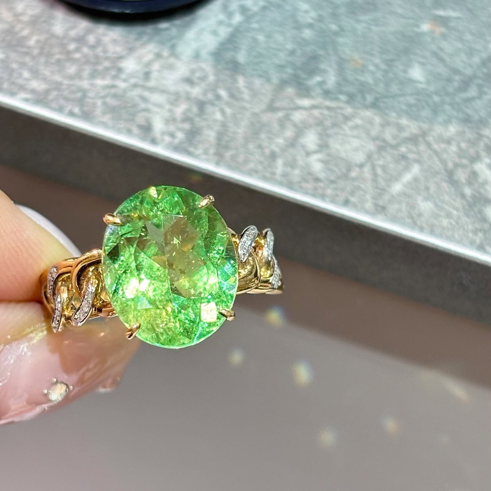 14k Gold 5.75 Ct Natural Tourmaline & Diamond Ring: Ref:231030422 // gold content:14k gold // ring size:7. 25us // // main gemstone:tourmaline // shape:oval // carat weight:5. 75ct // color:green // treatment:natural // // adjacent gemstone 2 :