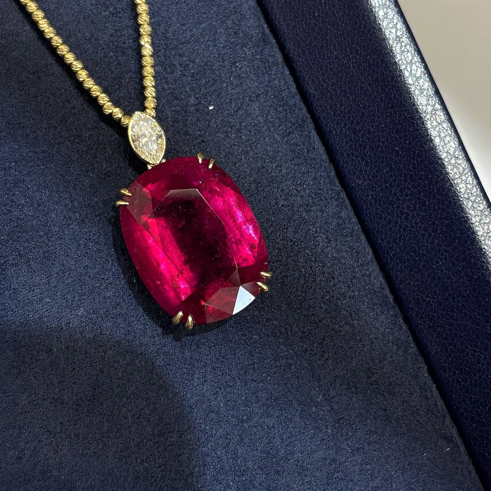 14k Gold 17.77 Ctw Natural Tourmaline & Diamond Pendant( Without Chain ): Ref:231030424 // gold content:14k gold // main gemstone:tourmaline // shape:cushion // carat weight:17. 37ct // color:red // treatment:natural // // adjacent gemstone 2 : diamond // shape:marquise //