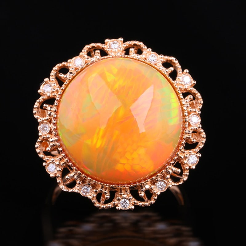 14k Gold 11.96 Ctw Natural Opal & Diamond Ring: Ref:231030444 // gold content:14k gold // ring size:7. 25us // // main gemstone:opal // shape:round // carat weight:11. 90ct // color:color // treatment:natural // cut grade:g // // adjacent gemstone 