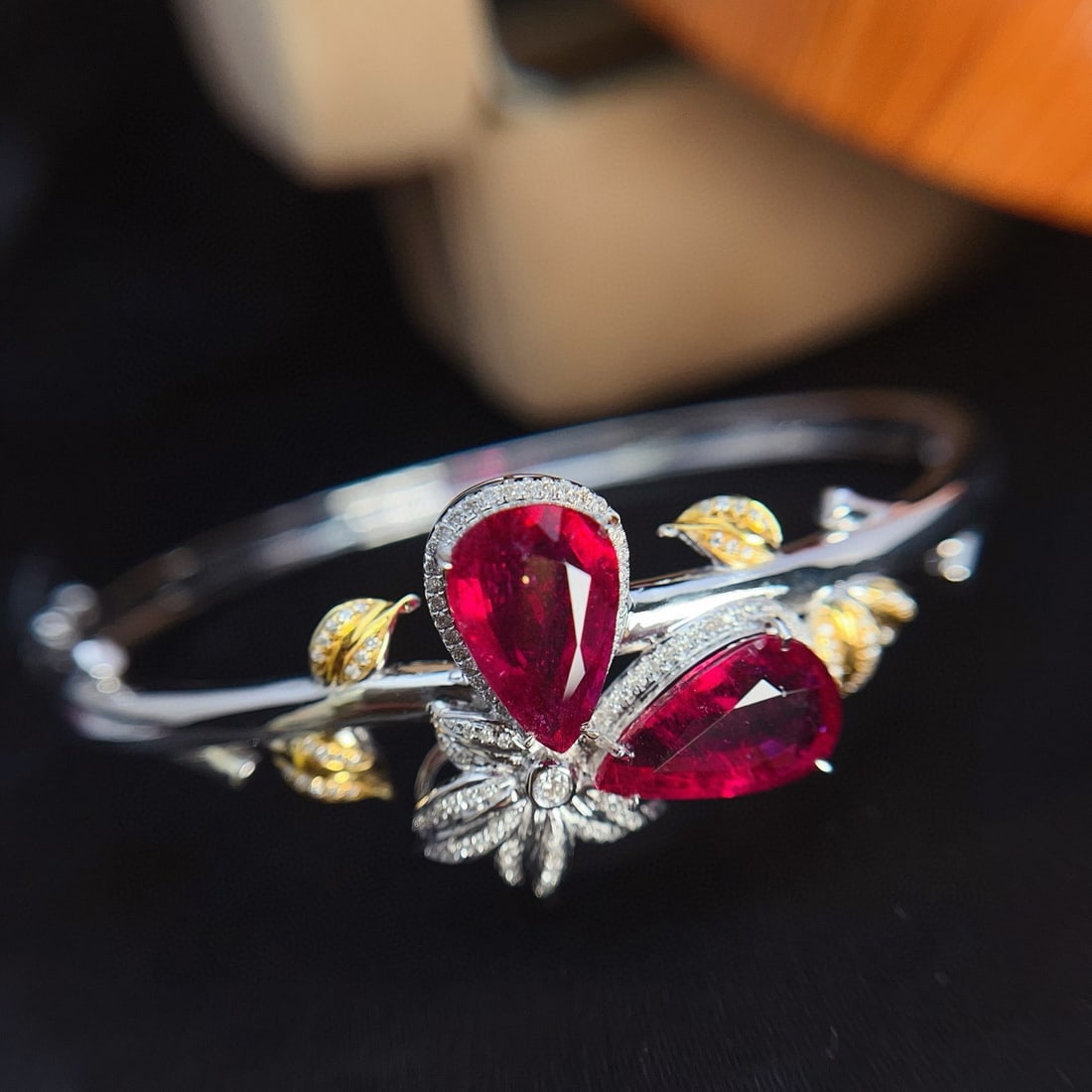 14k Gold 7.70 Ct Natural Tourmaline & Diamond Bangle: Ref:231031005 // gold content:14k gold // main gemstone:tourmaline // shape:pear // carat weight:7. 70ct // color:red // treatment:natural // // adjacent gemstone 2 : diamond // number of stones:151