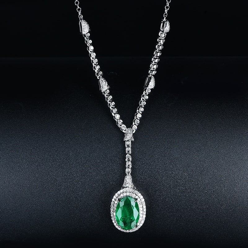 14k Gold 3.6 Ct Vivid Green Natural Emerald & Diamond Necklace: Ref:231031017 // gold content:14k gold // main gemstone:emerald // shape:oval // carat weight:3. 6ct // color:vivid green // treatment:natural // // adjacent gemstone 2 : diamond // shape:round //