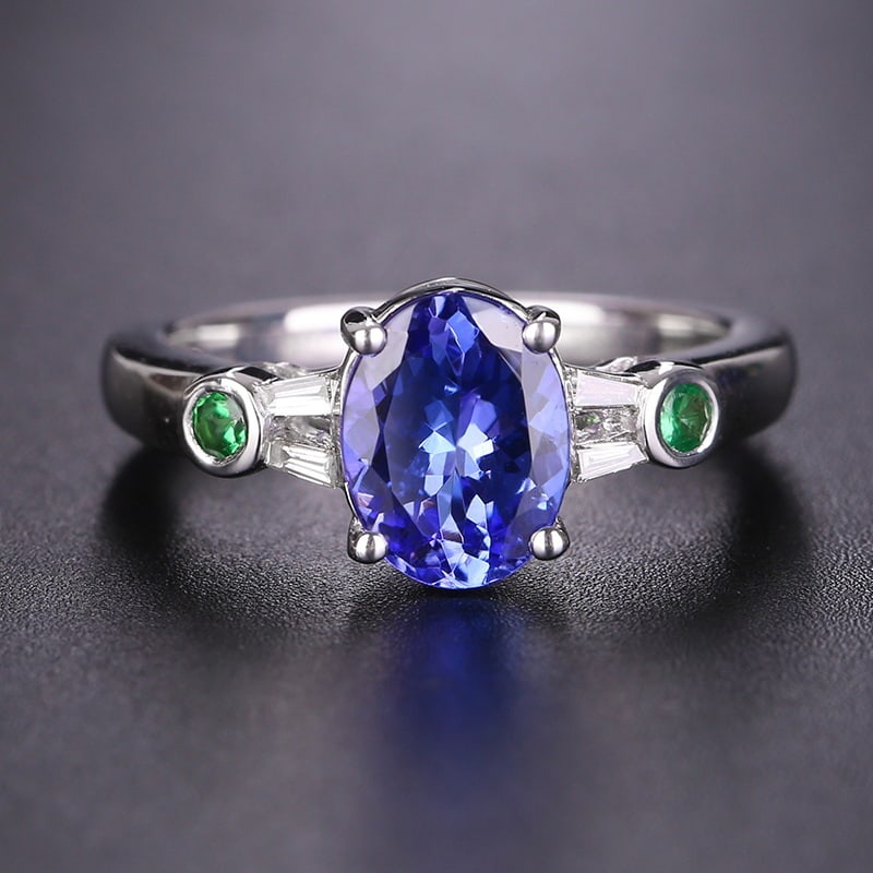 14k Gold 1.51 Ctw Natural Tanzanite & Diamond Ring: Ref:231031018 // gold content:14k gold // ring size:7. 25us // // main gemstone:tanzanite // shape:oval // carat weight:1. 45ct // color:blue // treatment:natural // // adjacent gemstone 2 : diamond