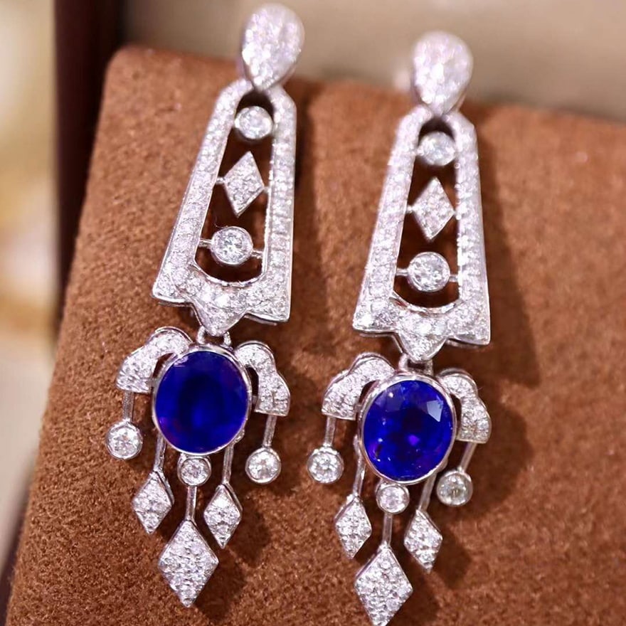 14k Gold 2.97 Ctw Natural Sapphire & Diamond Earrings: Ref:231031028 // gold content:14k gold // main gemstone:sapphire // shape:oval // carat weight:2. 10ct // color:blue // treatment:natural // // adjacent gemstone 2 : diamond // shape:round // carat we