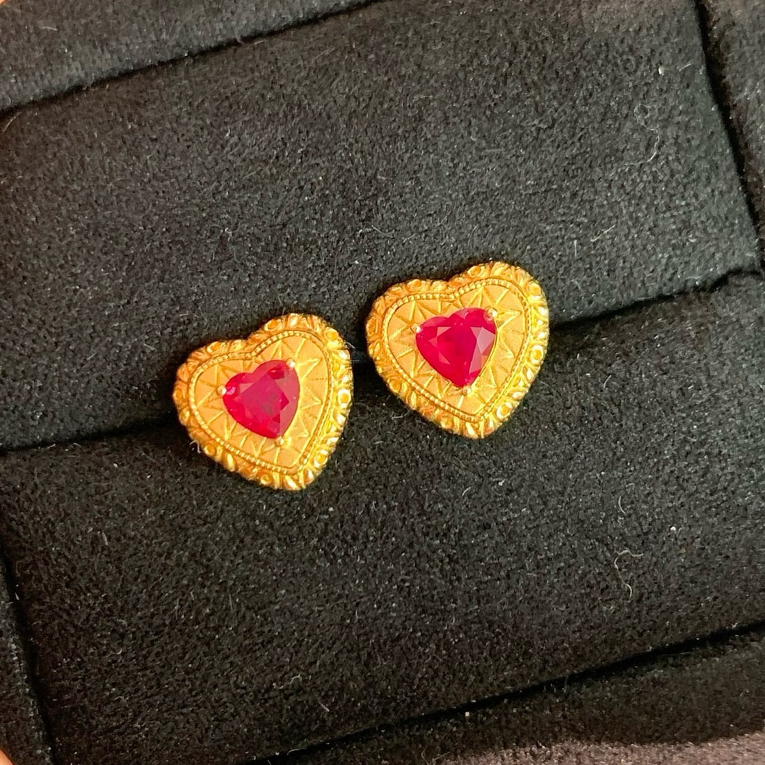 14k Gold 0.53 Ct Natural Ruby Earrings: Ref:231031051 // gold content:14k gold // main gemstone:ruby // shape:heart // carat weight:0. 53ct // color:red // treatment:natural // High Estimate: 7900 Condition: New Low Estimate: 5300