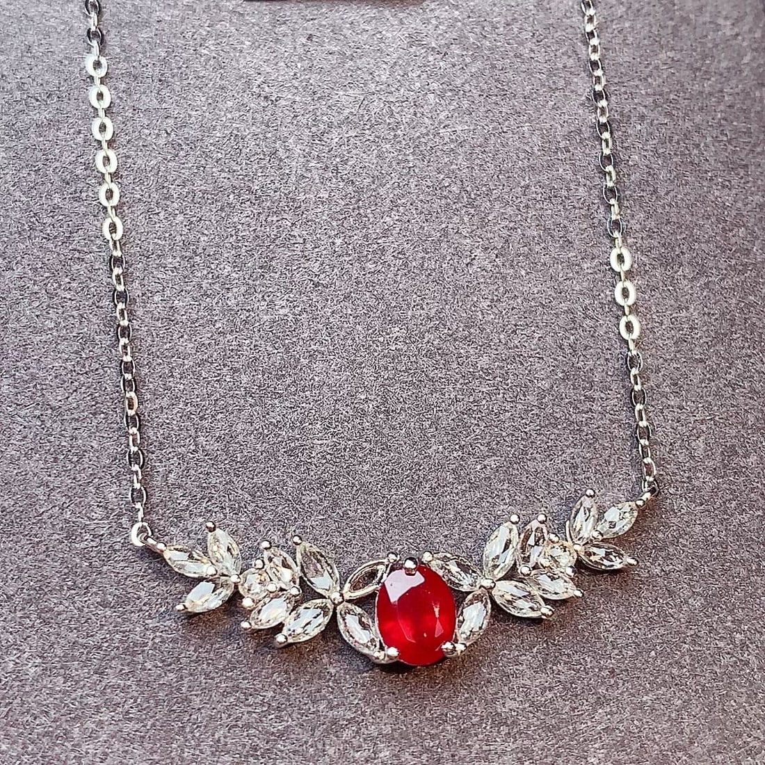 14k Gold 0.65 Ct Vivid Red Natural Ruby & Sapphire Necklace: Ref:231031059 // gold content:14k gold // main gemstone:ruby // shape:oval // carat weight:0. 65ct // color:vivid red // treatment:natural // // adjacent gemstone 2 : sapphire // number of stones:20