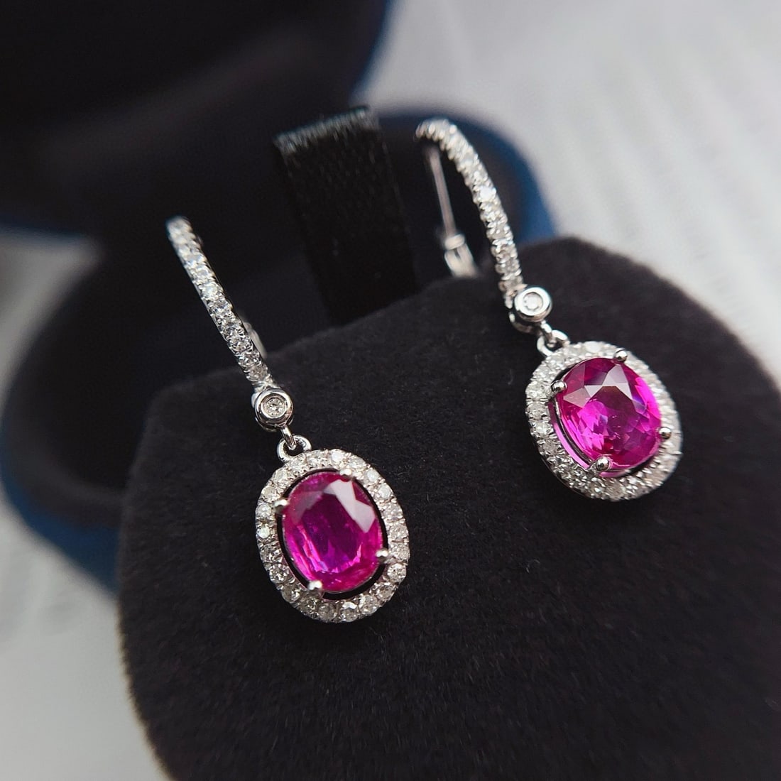 14k Gold 2.15 Ct Natural Ruby & Diamond Earrings: Ref:231031071 // gold content:14k gold // main gemstone:ruby // shape:oval // carat weight:2. 15ct // color:red // treatment:natural // // adjacent gemstone 2 : diamond // number of stones:78 // shape