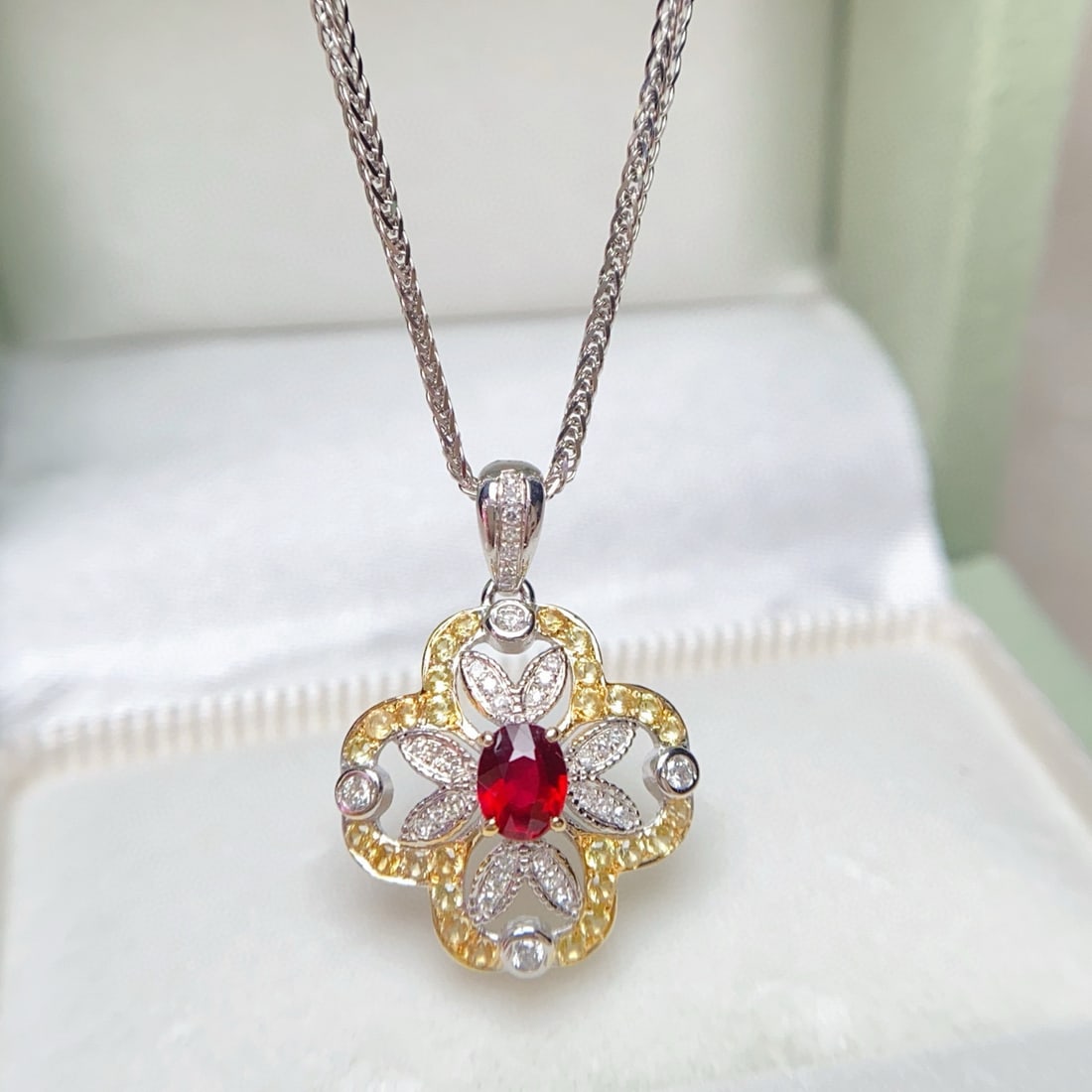 14k Gold 0.40 Ct Vivid Red Natural Ruby & Diamond & Sapphire Pendant( Without Chain ): Ref:231031092 // gold content:14k gold // main gemstone:ruby // shape:oval // carat weight:0. 40ct // color:vivid red // treatment:natural // // adjacent gemstone 2 : diamond // number of stones:30