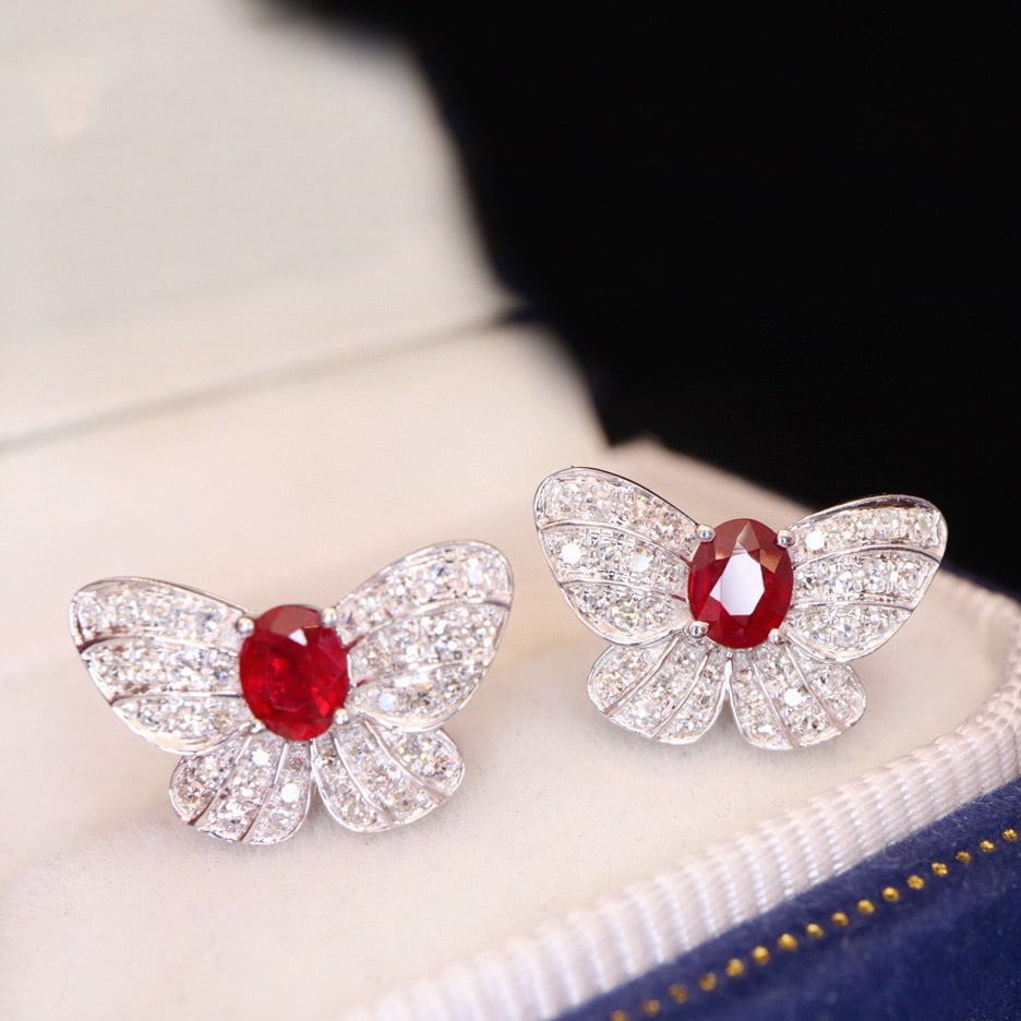 14k Gold 0.91 Ctw Natural Ruby & Diamond Earrings: Ref:231031109 // gold content:14k gold // main gemstone:ruby // shape:oval // carat weight:0. 57ct // color:pigeonblood red // treatment:natural // // adjacent gemstone 2 : diamond // shape:round //
