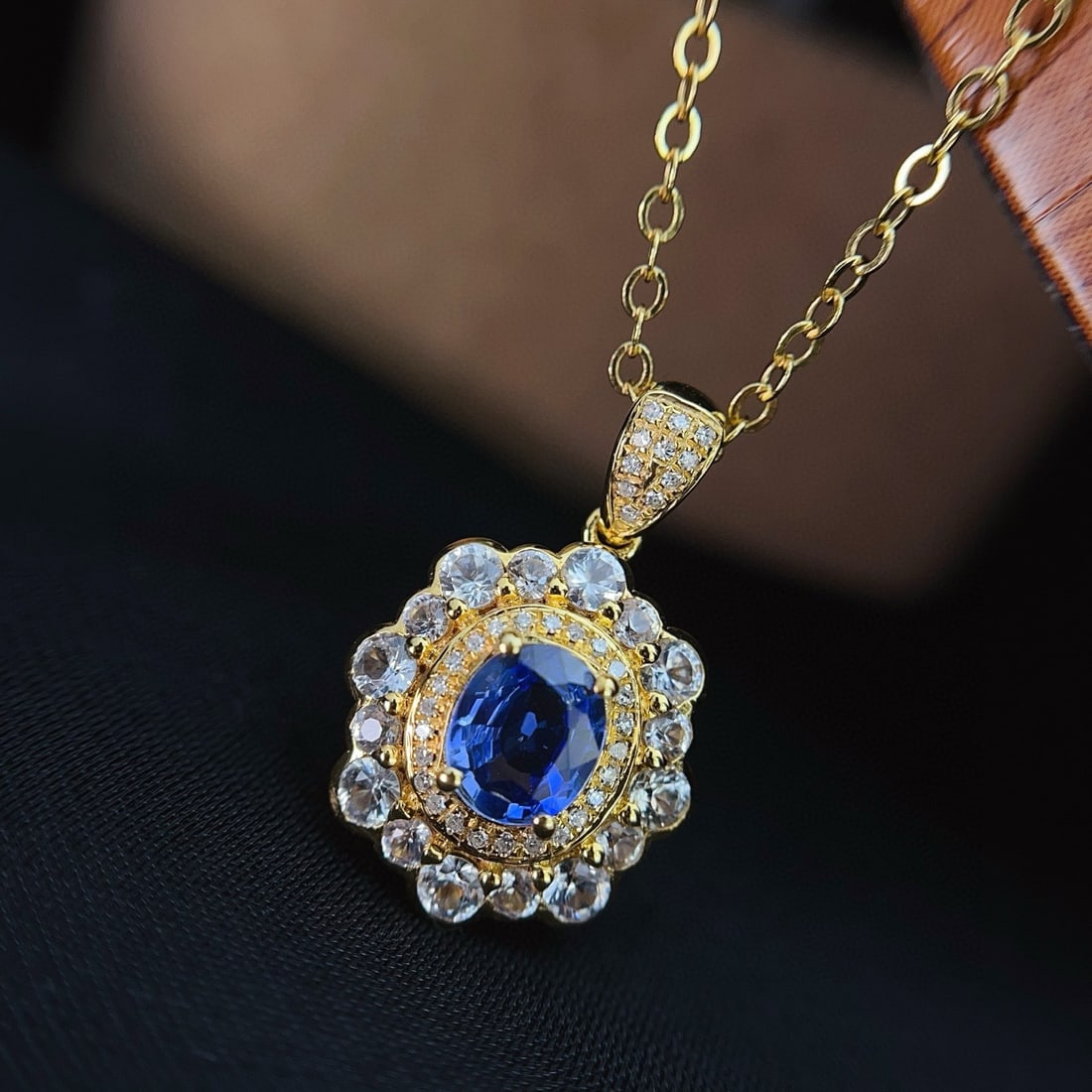 14k Gold 1.00 Ct Natural Sapphire & Diamond & Sapphire Pendant( Without Chain ): Ref:231031131 // gold content:14k gold // main gemstone:sapphire // shape:oval // carat weight:1. 00ct // color:blue // treatment:natural // // adjacent gemstone 2 : diamond // number of stones:37 //