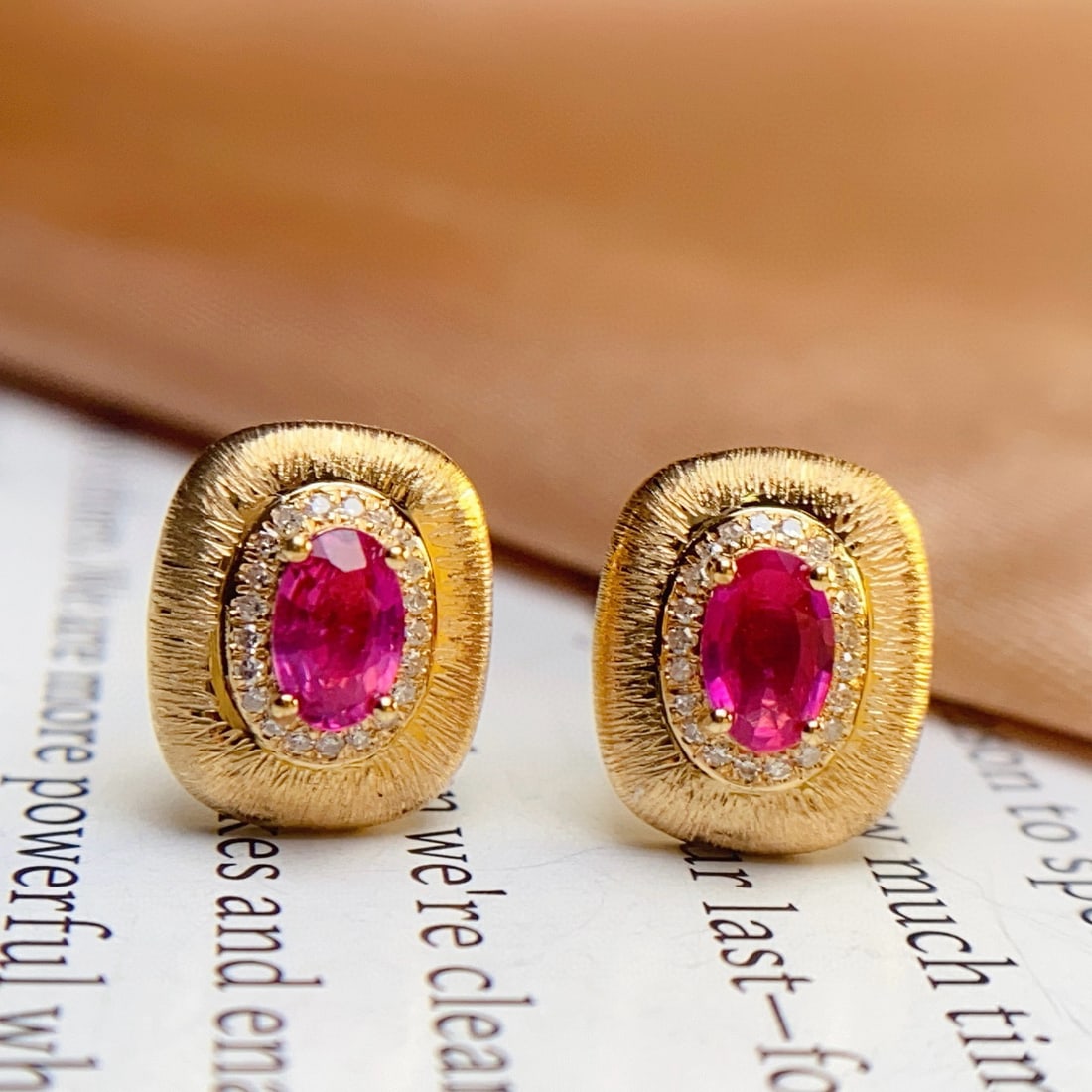 14k Gold 0.68 Ct Natural Ruby & Diamond Earrings: Ref:231031146 // gold content:14k gold // main gemstone:ruby // shape:oval // carat weight:0. 68ct // color:red // treatment:natural // // adjacent gemstone 2 : diamond // number of stones:42 //