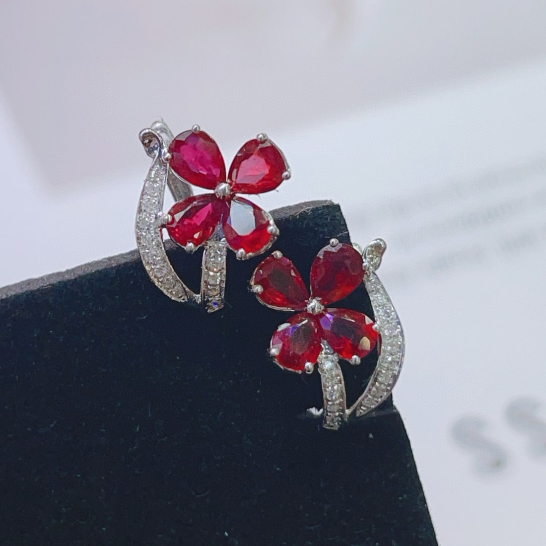 14k Gold 1.3 Ct Natural Ruby & Diamond Earrings: Ref:231031177 // gold content:14k gold // main gemstone:ruby // shape:pear // carat weight:1. 3ct // color:red // treatment:natural // // adjacent gemstone 2 : diamond // number of stones:30 //