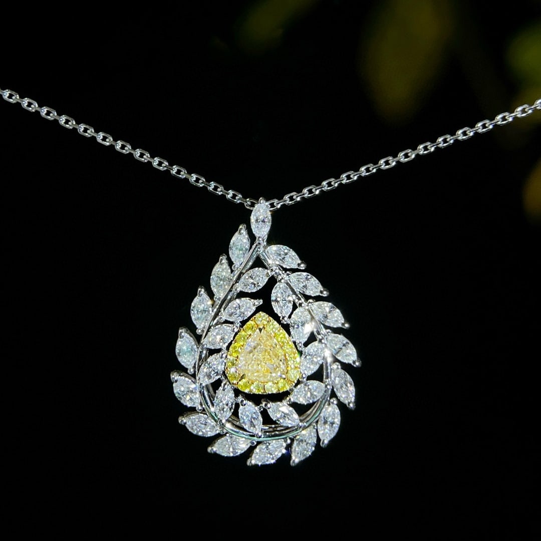 14k Gold 1.59 Ctw Natural Yellow Diamond & Diamond Necklace: Ref:231031192 // gold content:14k gold // main gemstone:yellow diamond // shape:pear // carat weight:0. 33ct // color:yellow // treatment:natural // // adjacent gemstone 2 : diamond // shape:marquise
