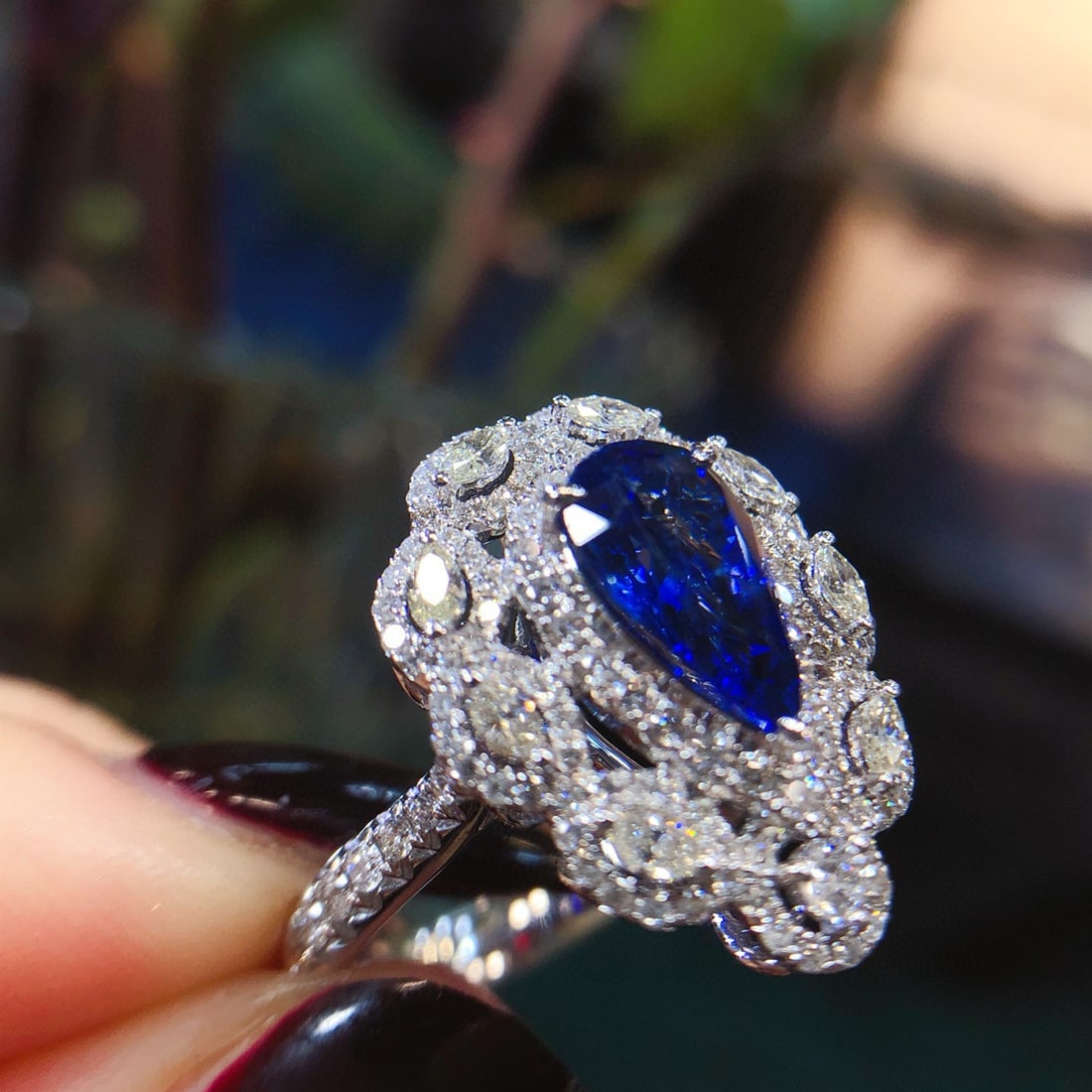 14k Gold 2.73 Ctw Natural Sapphire & Diamond Ring: Ref:231031202 // gold content:14k gold // ring size:7. 25us // // main gemstone:sapphire // shape:pear // carat weight:1. 78ct // color:royal blue // treatment:natural // // adjacent gemstone 2 :