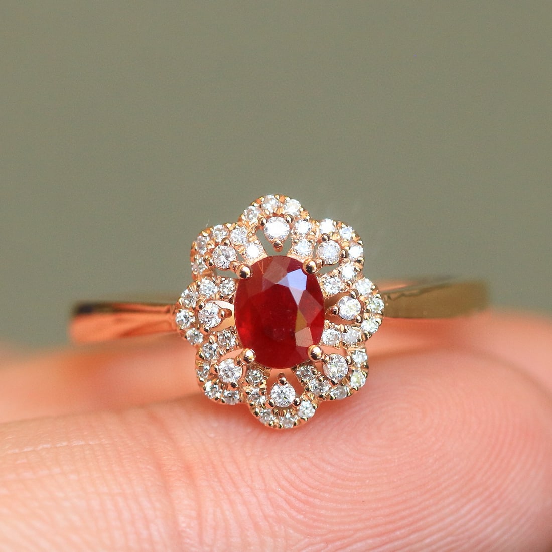 14k Gold 0.83 Ctw Natural Ruby & Diamond Ring: Ref:231031222 // gold content:14k gold // ring size:7. 25us // // main gemstone:ruby // shape:oval // carat weight:0. 6ct // color:pigeonblood red // treatment:natural // // adjacent gemstone 2 :