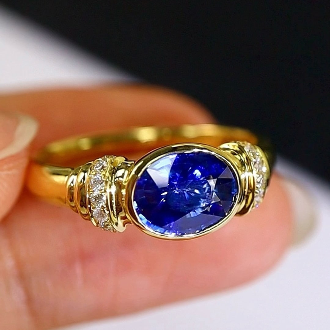 14k Gold 1.67 Ctw Natural Sapphire & Diamond Ring: Ref:231031256 // gold content:14k gold // ring size:7. 25us // // main gemstone:sapphire // shape:oval // carat weight:1. 55ct // color:royal blue // treatment:natural // // adjacent gemstone 2 :
