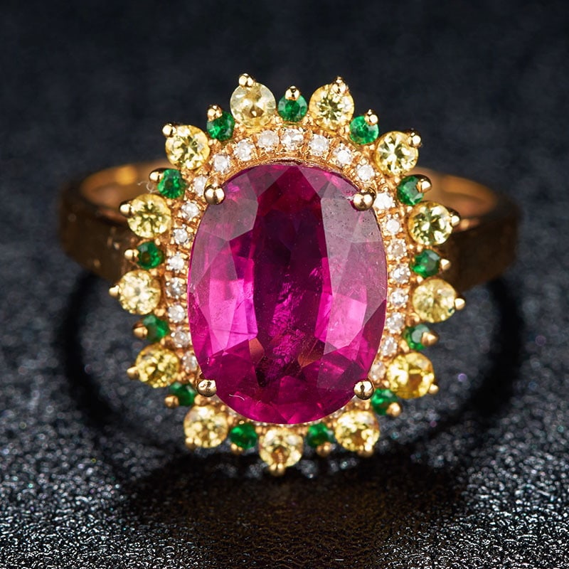 14k Gold 2.7 Ct Natural Tourmaline & Diamond & Sapphire & Tsavorite Ring: Ref:231032001 // gold content:14k gold // ring size:7. 25us // // main gemstone:tourmaline // shape:oval // carat weight:2. 7ct // color:red // treatment:natural // // adjacent gemstone 2 : diamond