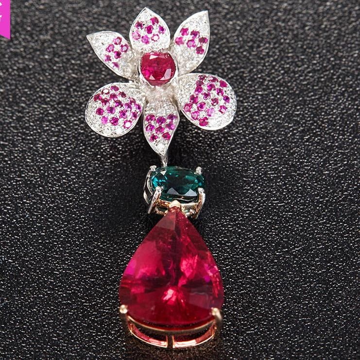 14k Gold 8.83 Ct Natural Tourmaline & Diamond & Ruby Pendant( Without Chain ): Ref:231032005 // gold content:14k gold // main gemstone:tourmaline // shape:pear // carat weight:8. 83ct // color:red // treatment:natural // // adjacent gemstone 2 : diamond // shape:round //