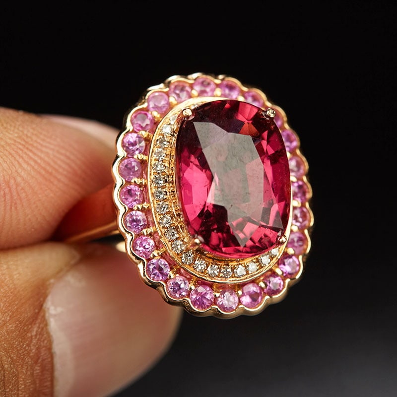 14k Gold 4.75 Ct Natural Tourmaline & Diamond & Sapphire Ring: Ref:231032006 // gold content:14k gold // ring size:7. 25us // // main gemstone:tourmaline // shape:oval // carat weight:4. 75ct // color:red // treatment:natural // // adjacent gemstone 2 : diamond