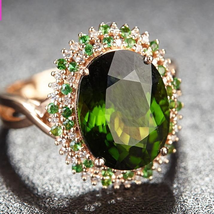 14k Gold 4.65 Ct Natural Tourmaline & Diamond & Tsavorite Ring: Ref:231032007 // gold content:14k gold // ring size:7. 25us // // main gemstone:tourmaline // shape:oval // carat weight:4. 65ct // color:green // treatment:natural // // adjacent gemstone 2 :