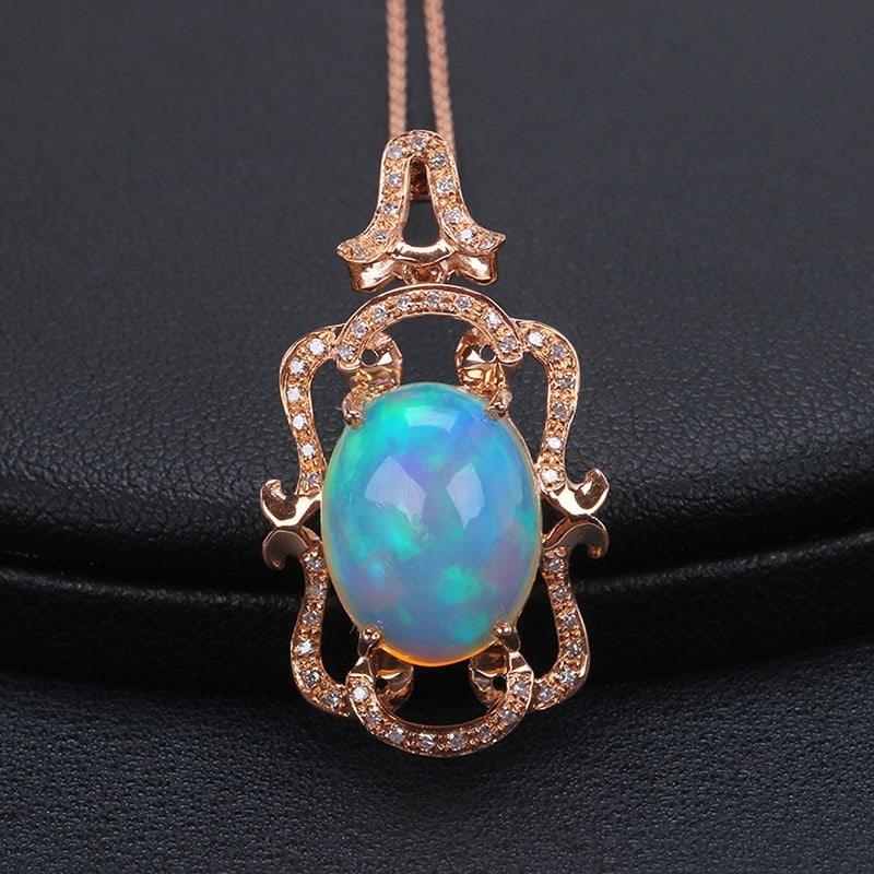 14k Gold 4.17 Ctw Natural Opal & Diamond Pendant( Without Chain ): Ref:231032025 // gold content:14k gold // main gemstone:opal // shape:oval // carat weight:4. 00ct // color:color // treatment:natural // // adjacent gemstone 2 : diamond // shape:round // carat