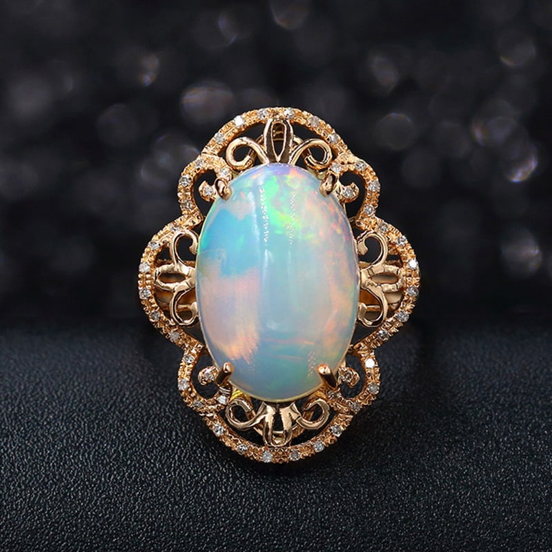 14k Gold 4.28 Ctw Natural Opal & Diamond Ring: Ref:231032026 // gold content:14k gold // ring size:7. 25us // // main gemstone:opal // shape:oval // carat weight:4. 15ct // color:color // treatment:natural // // adjacent gemstone 2 : diamond //