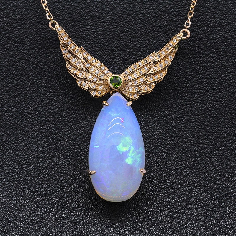 14k Gold 13.08 Ctw Natural Opal & Diamond Necklace: Ref:231032028 // gold content:14k gold // main gemstone:opal // shape:pear // carat weight:12. 88ct // color:color // treatment:natural // // adjacent gemstone 2 : diamond // shape:round // carat