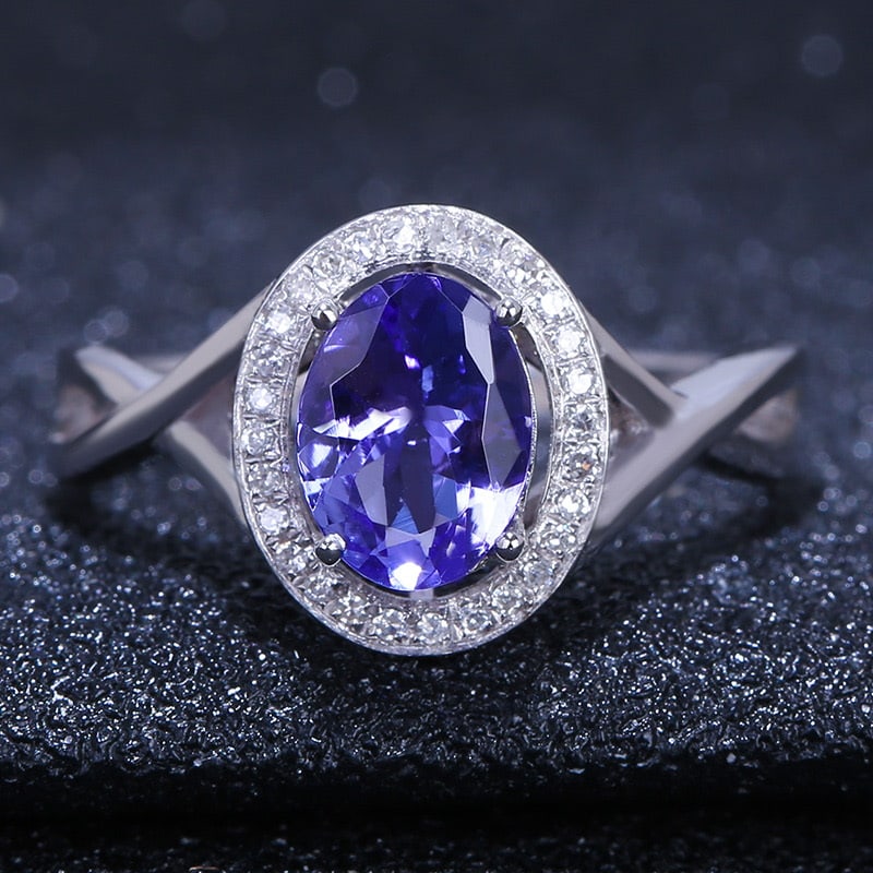 14k Gold 1.15 Ct Natural Tanzanite & Diamond Ring: Ref:231032031 // gold content:14k gold // ring size:7. 25us // // main gemstone:tanzanite // shape:oval // carat weight:1. 15ct // color:blue // treatment:natural // // adjacent gemstone 2 : diamond