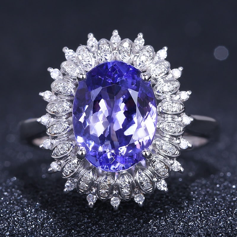 14k Gold 3.37 Ct Natural Tanzanite & Diamond Ring: Ref:231032033 // gold content:14k gold // ring size:7. 25us // // main gemstone:tanzanite // shape:oval // carat weight:3. 37ct // color:blue // treatment:natural // // adjacent gemstone 2 : diamond