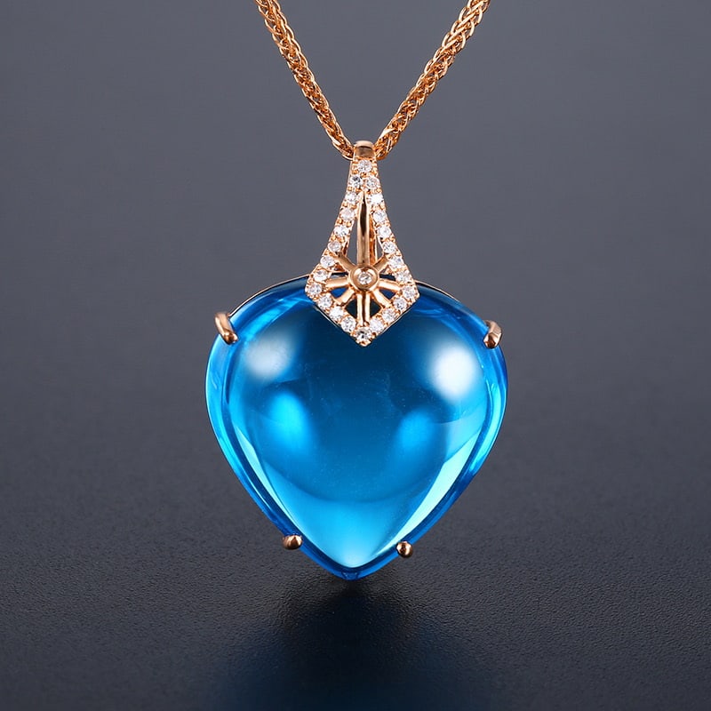 14k Gold 21.62 Ct Natural Topaz & Diamond Pendant( Without Chain ): Ref:231032037 // gold content:14k gold // main gemstone:topaz // shape:pear // carat weight:21. 62ct // color:blue // treatment:natural // // adjacent gemstone 2 : diamond // shape:round // clarity