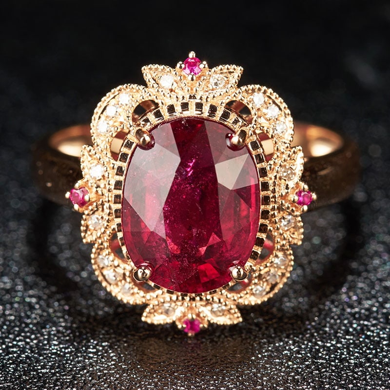 14k Gold 3 Ct Natural Tourmaline & Diamond Ring: Ref:231032043 // gold content:14k gold // ring size:7. 25us // // main gemstone:tourmaline // shape:oval // carat weight:3ct // color:red // treatment:natural // // adjacent gemstone 2 : diamond //