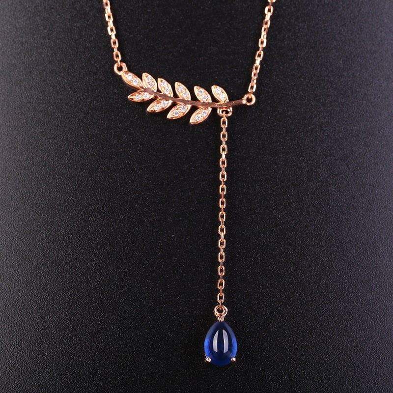 14k Gold 0.77 Ct Natural Sapphire & Diamond Necklace: Ref:231032062 // gold content:14k gold // main gemstone:sapphire // shape:pear // carat weight:0. 77ct // color:blue // treatment:natural // // adjacent gemstone 2 : diamond // shape:round // clarity