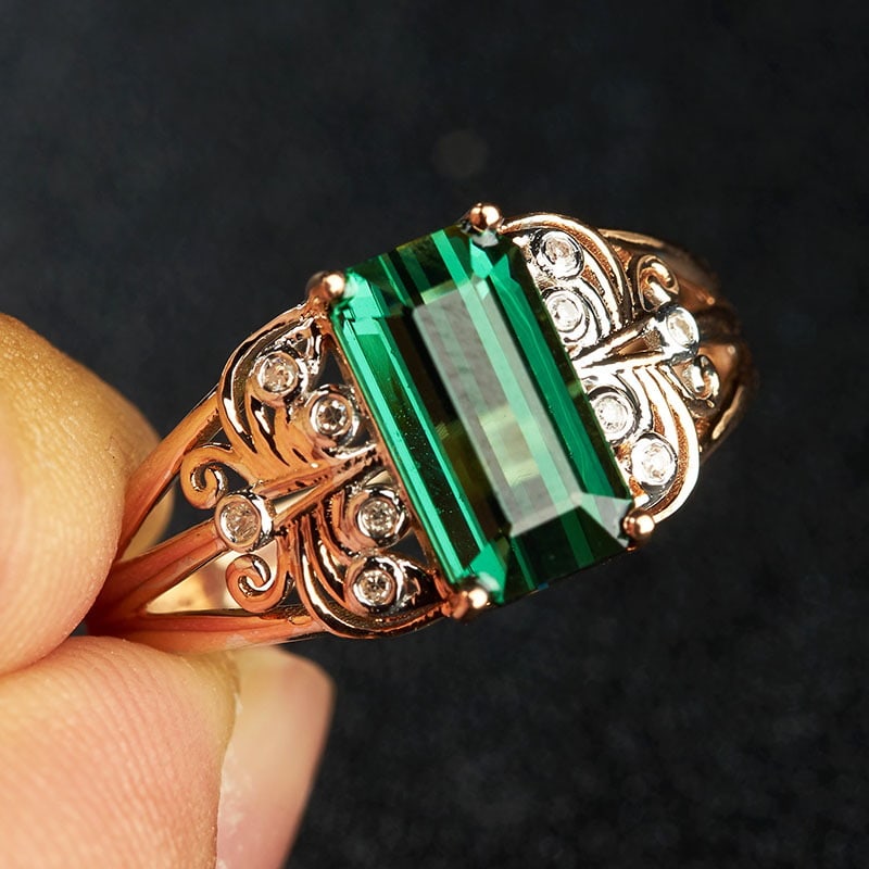 14k Gold 2 Ct Natural Tourmaline & Diamond Ring: Ref:231032077 // gold content:14k gold // ring size:7. 25us // // main gemstone:tourmaline // shape:octagonal // carat weight:2ct // color:green // treatment:natural // // adjacent gemstone 2 :