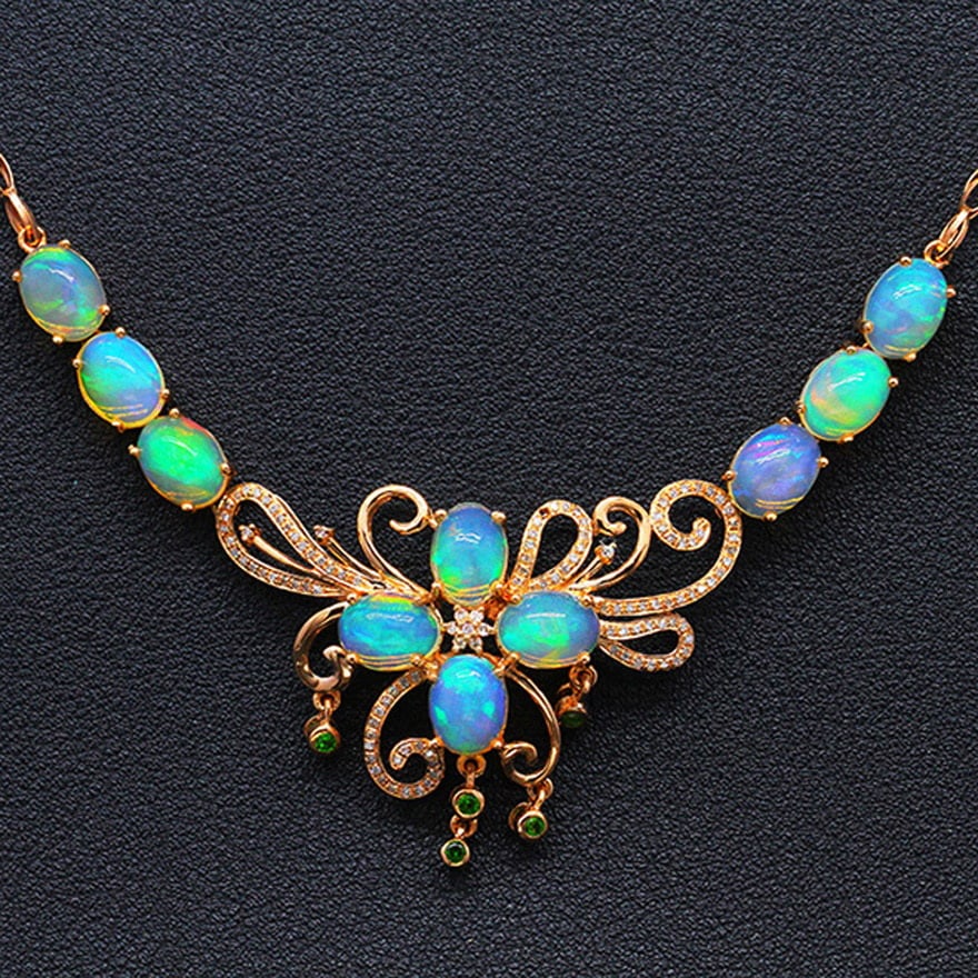 14k Gold 10.89 Ctw Natural Opal & Diamond Necklace: Ref:231032078 // gold content:14k gold // main gemstone:opal // shape:oval // carat weight:10. 52ct // color:color // treatment:natural // // adjacent gemstone 2 : diamond // shape:round // carat