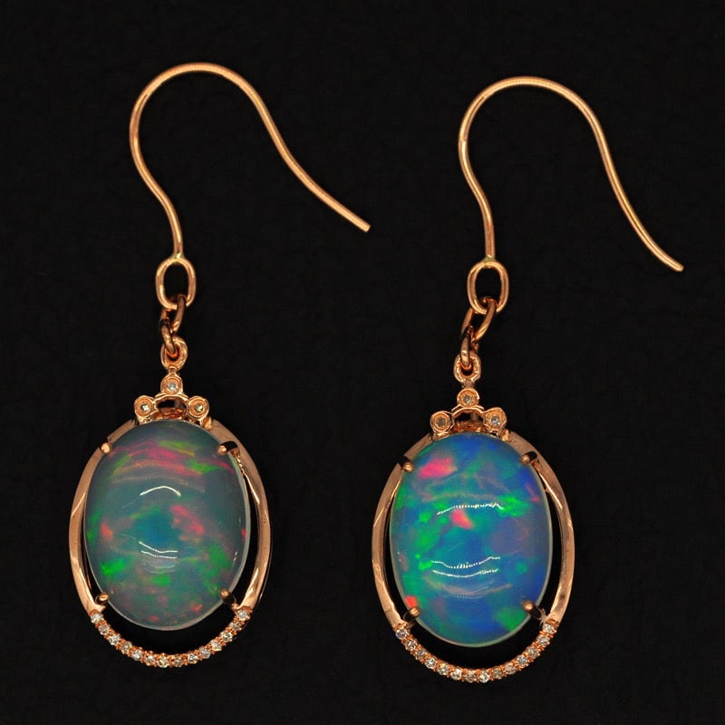 14k Gold 7.90 Ct Natural Opal & Diamond Earrings: Ref:231032082 // gold content:14k gold // main gemstone:opal // shape:oval // carat weight:7. 90ct // color:color // treatment:natural // // adjacent gemstone 2 : diamond // shape:round // clarity gra