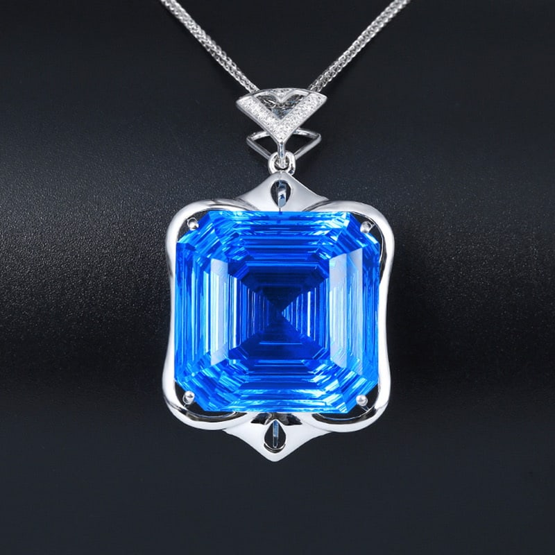 14k Gold 28.05 Ct Natural Topaz & Diamond Pendant( Without Chain ): Ref:231032102 // gold content:14k gold // main gemstone:topaz // shape:octagonal // carat weight:28. 05ct // color:blue // treatment:natural // // adjacent gemstone 2 : diamond // shape:round //