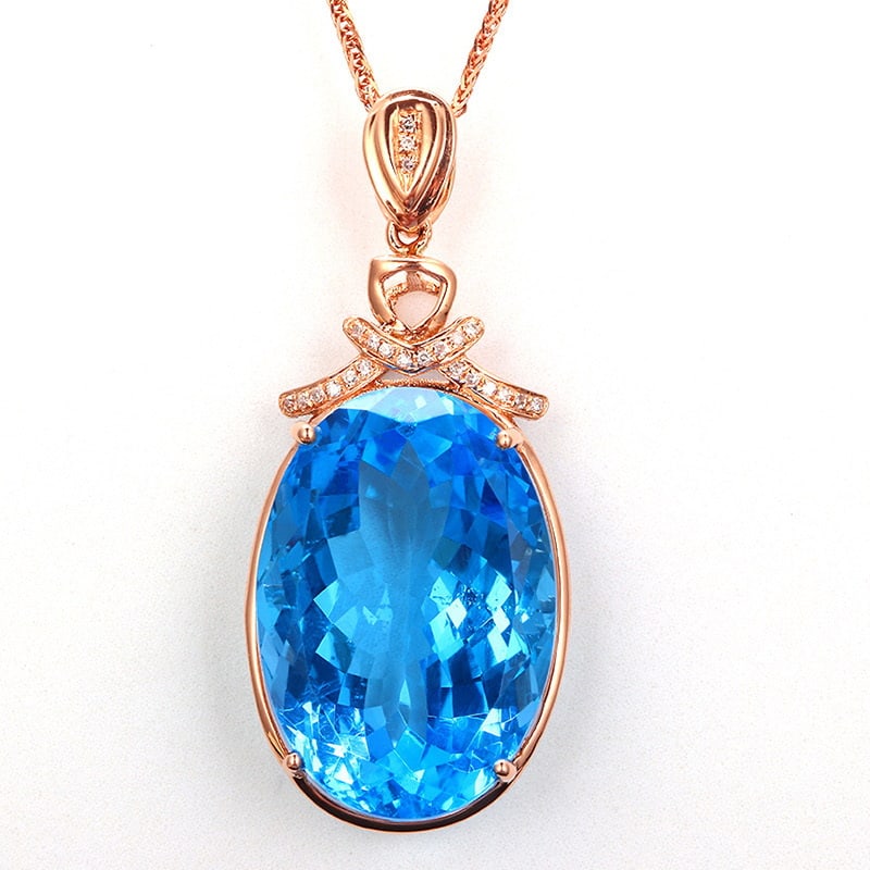 14k Gold 22.63 Ctw Natural Topaz & Diamond Pendant( Without Chain ): Ref:231032104 // gold content:14k gold // main gemstone:topaz // shape:oval // carat weight:22. 56ct // color:blue // treatment:natural // // adjacent gemstone 2 : diamond // shape:round // carat