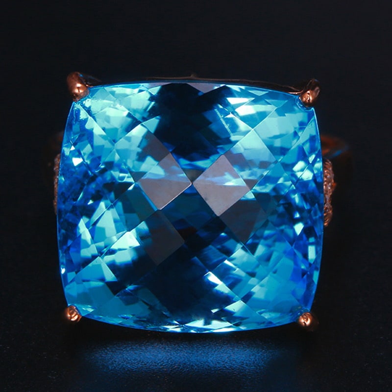 14k Gold 29.79 Ctw Natural Topaz & Diamond Ring: Ref:231032105 // gold content:14k gold // ring size:7. 25us // // main gemstone:topaz // shape:cushion // carat weight:29. 74ct // color:blue // treatment:natural // // adjacent gemstone 2 : diamond
